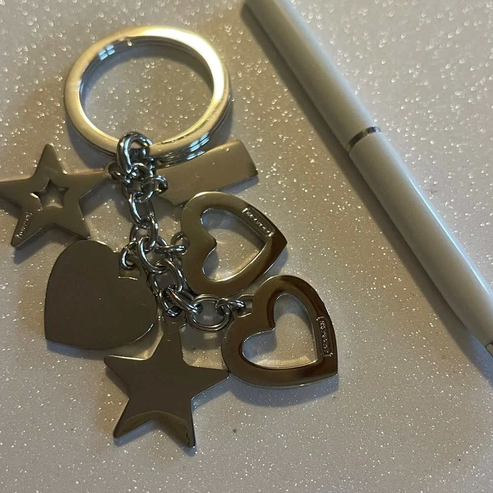 Coach keychain dangling